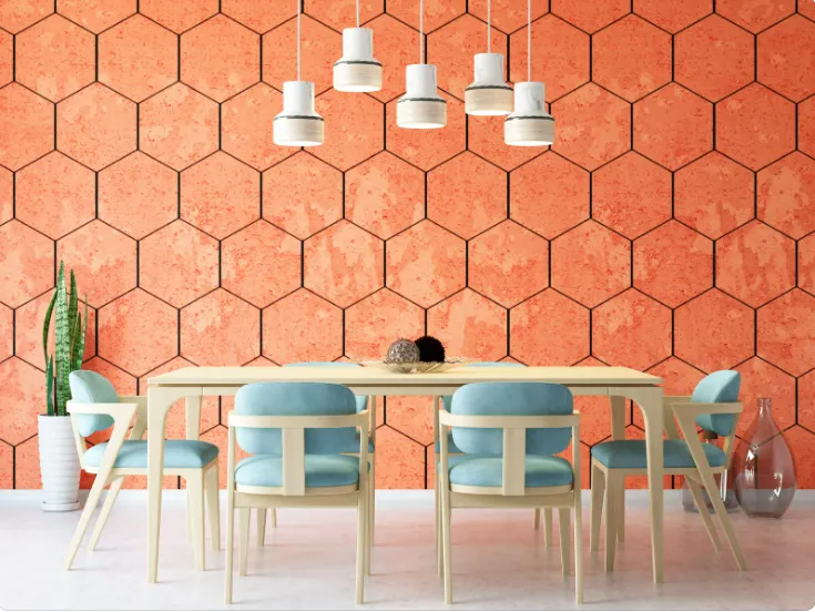 Modern dining area with light wood table, pastel blue chairs, and orange hexagon wall for ceiling & specialty surface removal.