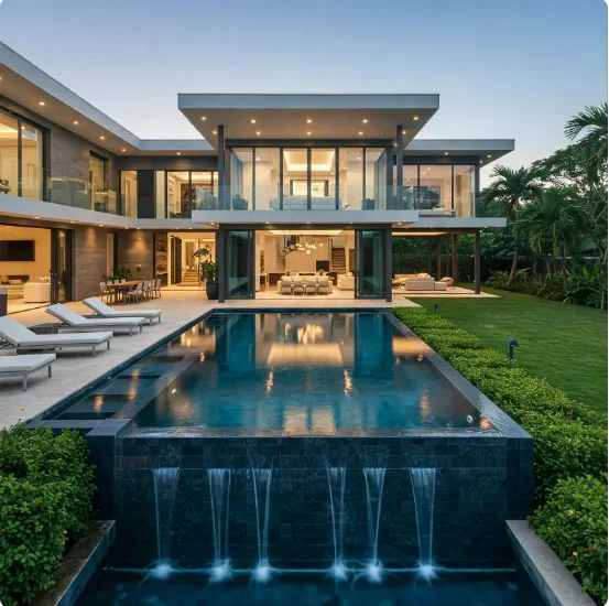 Luxury modern home with glass facade, pool, and lush garden, showcasing elegant landscaping and hardscaping at dusk.