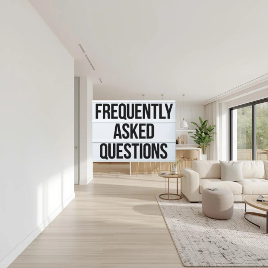 Home remodeling FAQ banner with “Frequently Asked Questions” text over modern living room and kitchen background