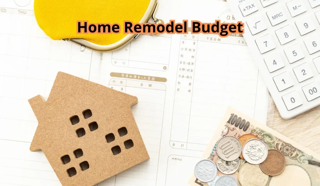 Home remodel budget planning with calculator, cash and house model for remodeling costs.